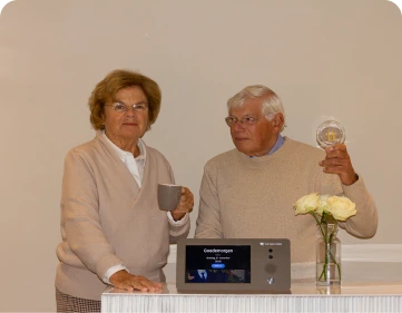 Cliënten van Livwell met een Genus-apparaat